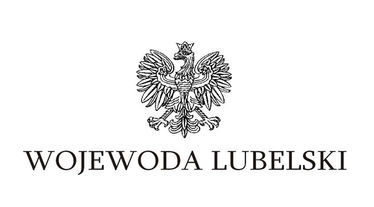 Zdjęcie przedstawia godło państwowe z napisem Wojewoda Lubelski na białym tle