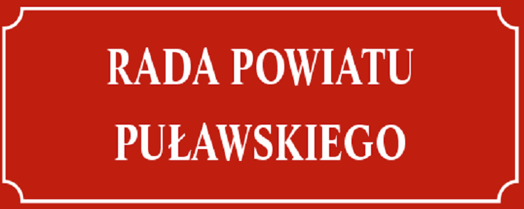   Czerwona tablica z białym napisem, Rada Powiatu Puławskiego.