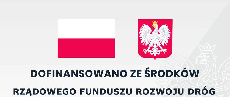 Tablica z flagą biało czerwoną i godłem Polski na dole "DOFINANSOWANO ZE ŚRODKÓW  RZĄDOWEGO FUNDUSZU ROZWOJU DRÓG"
