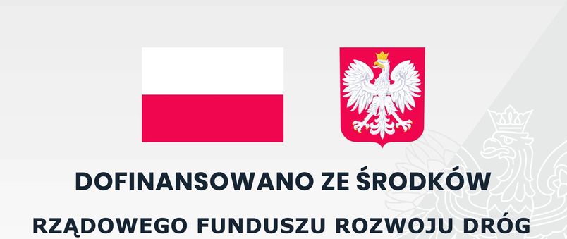 Tablica z flagą biało czerwoną i godłem Polski na dole "DOFINANSOWANO ZE ŚRODKÓW  RZĄDOWEGO FUNDUSZU ROZWOJU DRÓG"
